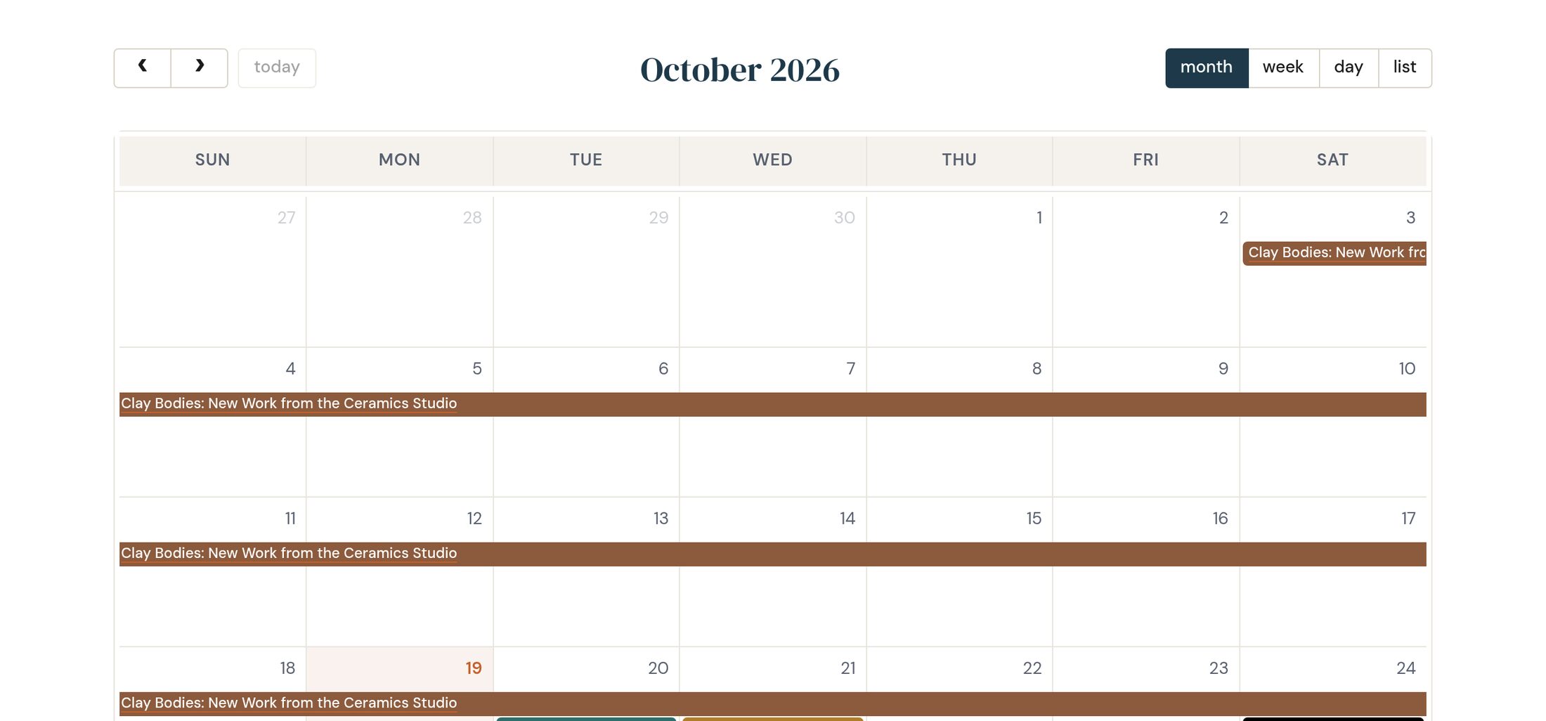 A month view of October showing a multi-day exhibition running as a band across each week, with weekly evening classes and a Saturday children's class